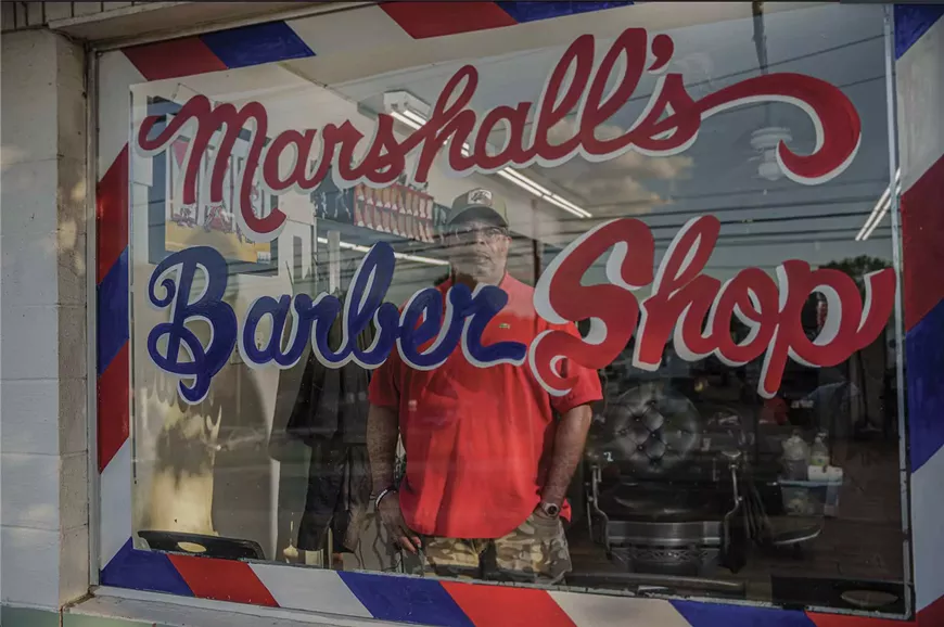 Kevin Asperry at Marshall's Barber Shop on 12th Street, by Steven Hatchett